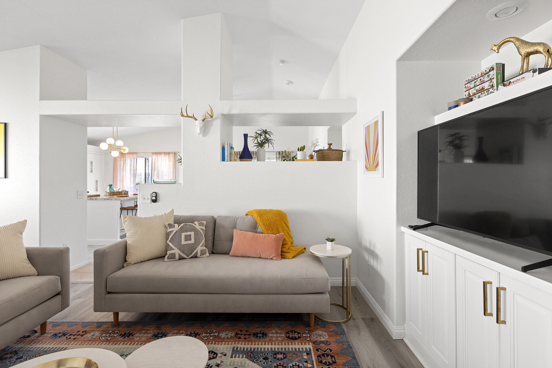 Kitchen island with bar seating and turquoise accents